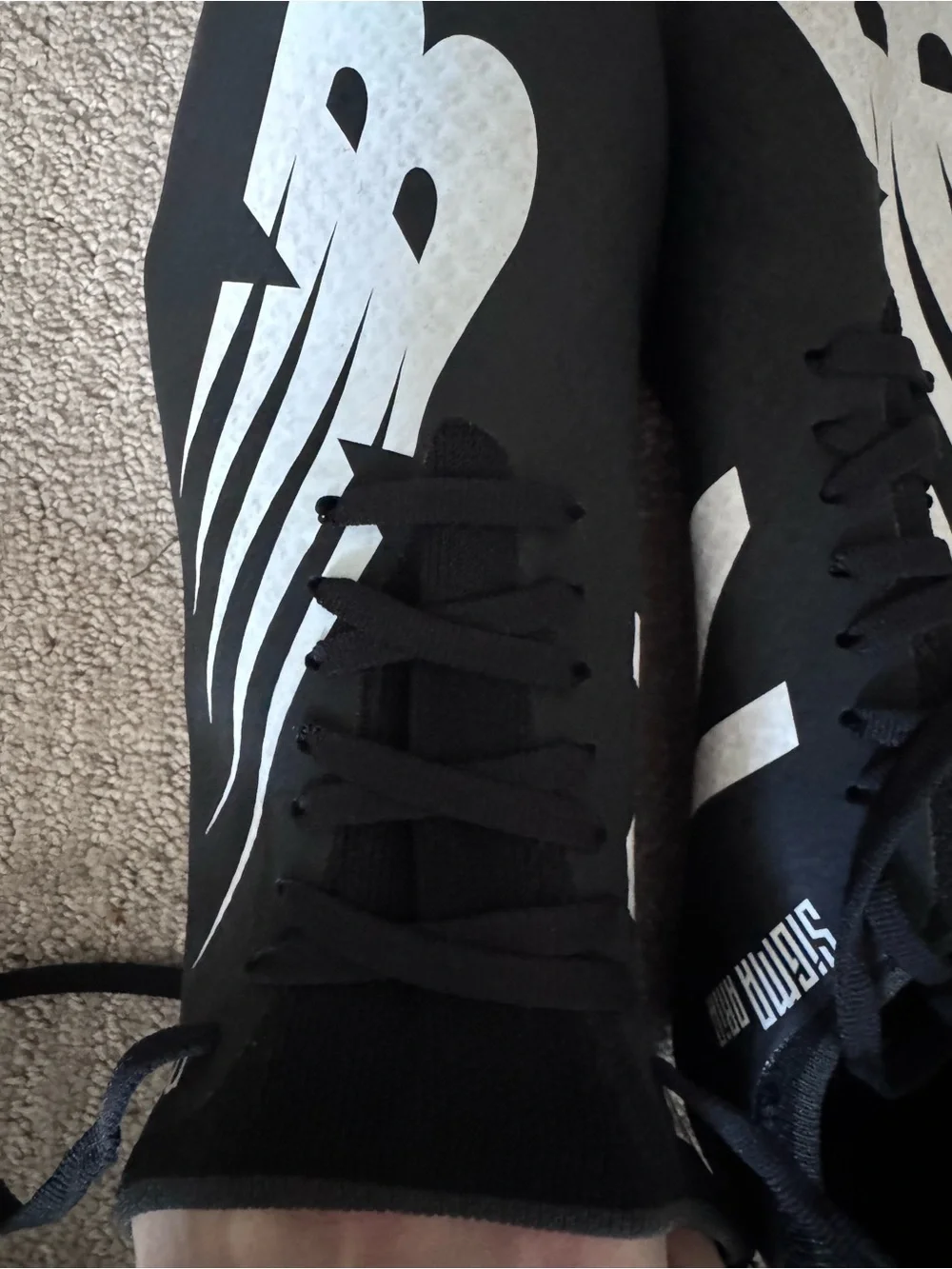 New Balance Black metal track cleats with White Logo 11sz